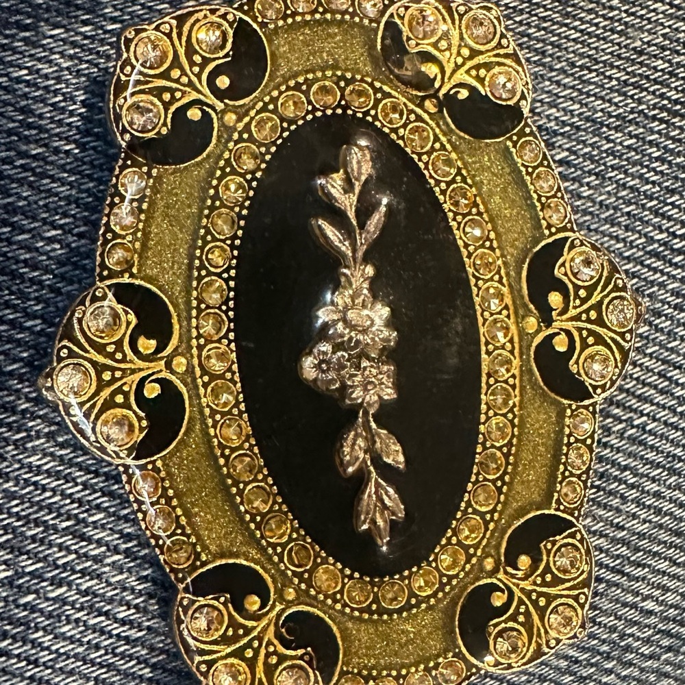 Beautiful brooch from France. Twinkles in the light.  Size of a quarter